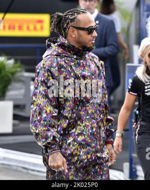 Lewis Hamilton of Great Britain and Mercedes walks in the Paddock prior to practice ahead of the F1 Grand Prix of Italy at Autodromo Nazionale Monza on September 09, 2022 in Monza, Italy Stock Photo