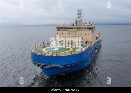 The ice breaker with a platform for helicopter landing, in the middle of a gulf. Stock Photo