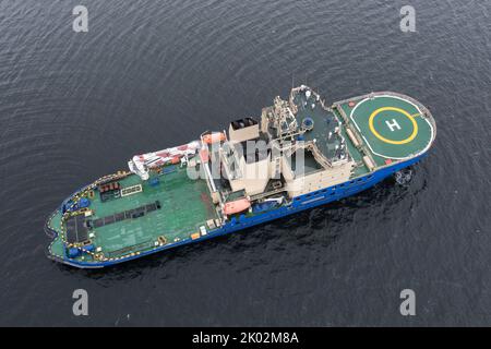 The ice breaker with a platform for helicopter landing, in the middle of a gulf. Stock Photo