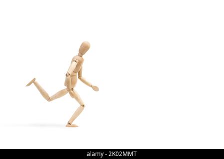 A wooden mannequin toy running posture on a white background with copy space Stock Photo