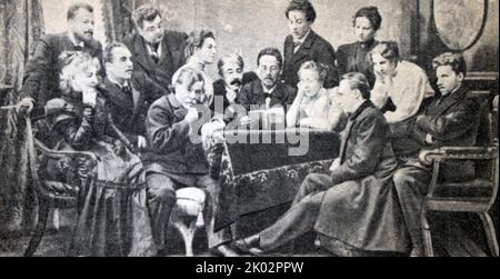 A.P. Chekhov reads his play Uncle Vanya to the artists of the Art Theater. Photo. 1899. Anton Pavlovich Chekhov (1860 - 1904) was a Russian playwright and short-story writer who is considered to be among the greatest writers of short fiction in history. Stock Photo