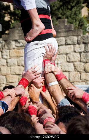 Castellers performing in Plaza Octavia in Sant Cugat del Valles in the province of Barcelona in Catalonia Spain Stock Photo