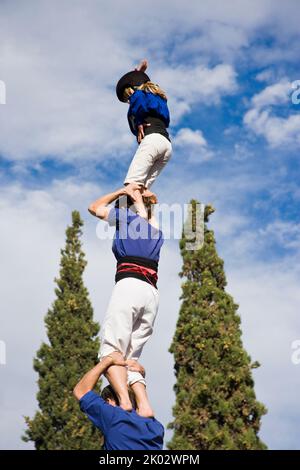 Castellers performing in Plaza Octavia in Sant Cugat del Valles in the province of Barcelona in Catalonia Spain Stock Photo