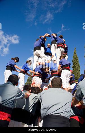 Castellers performing in Plaza Octavia in Sant Cugat del Valles in the province of Barcelona in Catalonia Spain Stock Photo