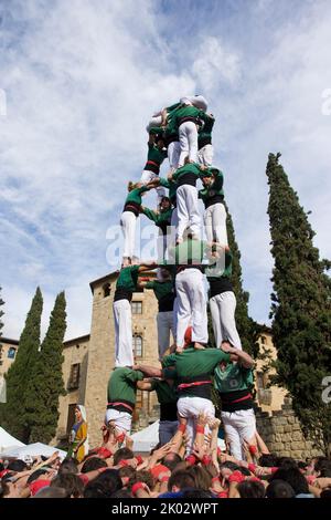 Castellers performing in Plaza Octavia in Sant Cugat del Valles in the province of Barcelona in Catalonia Spain Stock Photo