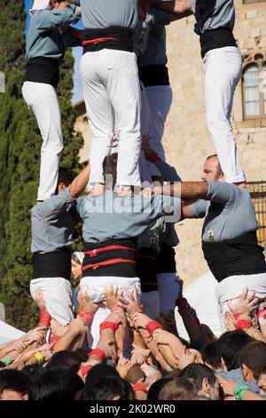 Castellers performing in Plaza Octavia in Sant Cugat del Valles in the province of Barcelona in Catalonia Spain Stock Photo