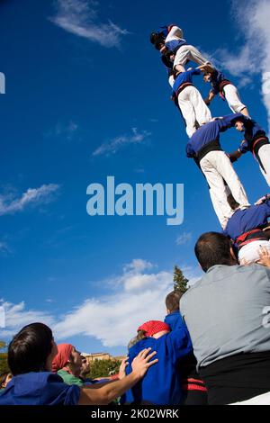 Castellers performing in Plaza Octavia in Sant Cugat del Valles in the province of Barcelona in Catalonia Spain Stock Photo