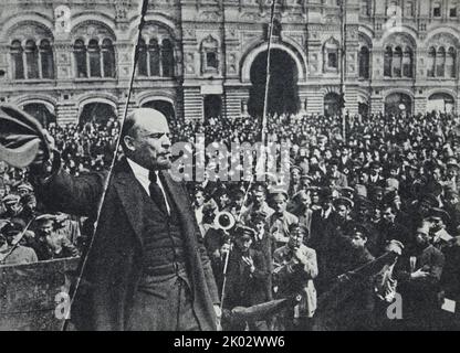 Vladimir Lenin delivers a speech from the rostrum on Red Square on the ...