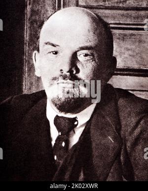 Vladimir Lenin in the Kremlin presides over a meeting of the Council of People's Commissars for recovery from injury. 1918, October 17. Moscow. Photographer - Otsup P. A. Stock Photo