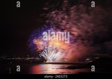 A colorful firework display from the 2021 British firework championships held at Plymouth, Devon. Stock Photo