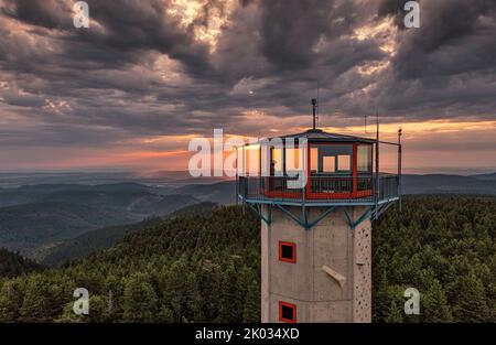 Germany, Thuringia, Suhl, Gehlberg, Schneekopf (second highest mountain of Thuringian Forest), lookout and climbing tower, forest, mountains, back light Stock Photo