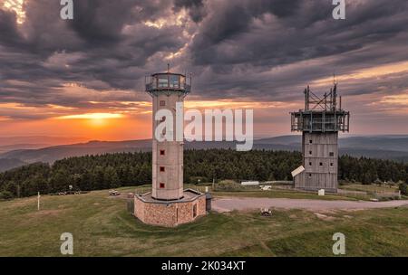 Germany, Thuringia, Suhl, Gehlberg, Schneekopf (second highest mountain of Thuringian Forest), observation and climbing tower, telecommunications tower, forest, mountains, sun Stock Photo
