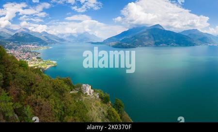 Aerial view of the church of Sant'Eufemia in Musso overlooking Lake Como. Musso, Como district, Lake Como, Lombardy, Italy. Stock Photo