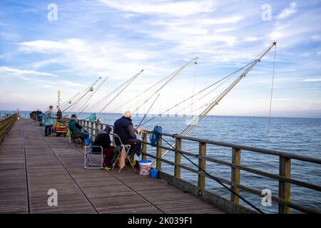 Angler at Lido di Volano on the Adriatic Sea, Emilia-Romagna, Italy Stock Photo