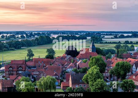 Early morning view from the vineyard in Hitzacker to the old town and the river Elbe Stock Photo