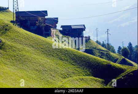 Mountain farms on steep mountain slopes in the South Tyrolean Ulten Valley Stock Photo