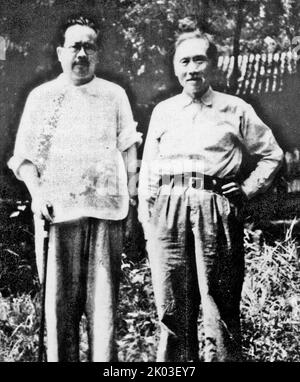 Ren Bishi took a group photo with Xu Teli who came to visit him. Ren Bishi was a military and political leader in the early Chinese Communist Party. In the early 1930s, Stock Photo