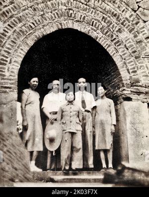Ren Bishi took a group photo with his uncle Ren Liqing and his wife at Yuquan Mountain in Beijing. Ren Bishi was a military and political leader in the early Chinese Communist Party. In the early 1930s, Stock Photo