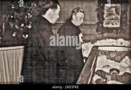 Liu Shaoqi and Zhou Enlai attend funeral of Ren Bishi. Ren Bishi was a military and political leader in the early Chinese Communist Party. In the early 1930s, Stock Photo