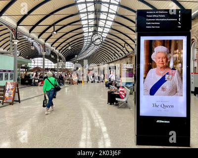 Newcastle, United Kingdom. 9th September 2022. Britain has begun a 10-day mourning period for Queen Elizabeth II. Signages have been put up around England. Newcastle Central Station is a major railway station in Newcastle upon Tyne. It is located on the East Coast Main Line, around 268 miles north of London King's Cross. Stock Photo