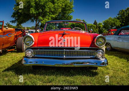 Falcon Heights, MN - June 17, 2022: Low perspective front view of a 1955 Ford Fairlane Sunliner Convertible at a local car show. Stock Photo