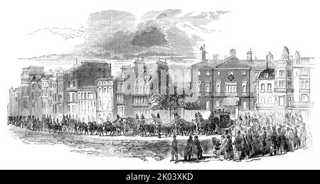 The Funeral Procession leaving Cambridge House, Piccadilly, [London], 1850. Death of Prince Adolphus, Duke of Cambridge. '...some few hundred persons had assembled on the brow of the hill opposite Cambridge House...Shortly after five o'clock, the 1st and 2nd battalions of the Coldstream Guards (the late Duke's regiment) marched through Piccadilly, en route from St. George's Barracks to Kew, where it had been arranged they should form a guard of honour to receive the Royal remains upon their arrival. One hundred men of the regiment filed off at Cambridge House...and formed in the courtyard in f Stock Photo