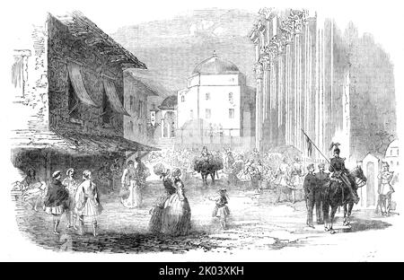 Street in Athens, 1854. View of '...the every-day life of Athens, in one of its public thoroughfares, wherein we have a glimpse of its ancient and modern buildings, and the picturesque crowds which people its streets. The classic edifice upon the right is the Stoa of Hadrian [Roman remains], which stands near the market place, and is partly concealed by modern erections. Eight Corinthian columns, with their capitals, remain perfect, and project in front of the ancient wall of the inclosure; the column in the foreground is six feet in advance, and the arched gateway leads to a barrack. The old Stock Photo