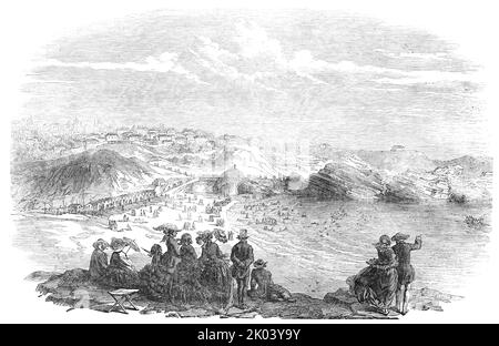 Biaritz, 1854. 'Biaritz is described in Murray's Handbook as a little secluded watering-place...&quot;It consists of a group of white-washed lodging- houses, cafes, inns, traiteurs, cottages, &amp;c., and generally of a humble character&quot;...The health of the Empress, which had for some time previous to her visit been very delicate, is said to have been greatly improved by the genial climate of Biaritz [Biarritz in south western France]. The Emperor goes every morning to bathe...The limpid purity of the sea and the smoothness of the sand render bathing in the sheltered bays most agreeable. Stock Photo