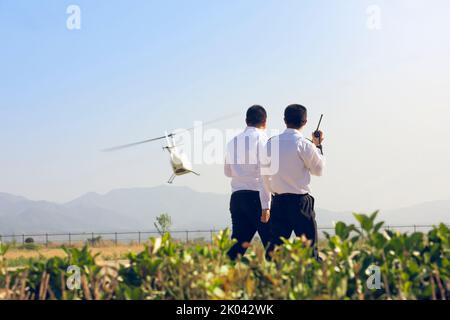 Chinese air traffic controllers with walkie-talkie Stock Photo