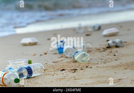 Plastic bottles thrown onto the beach by ocean currents. Borneo, Malaysia, South East Asia Stock Photo
