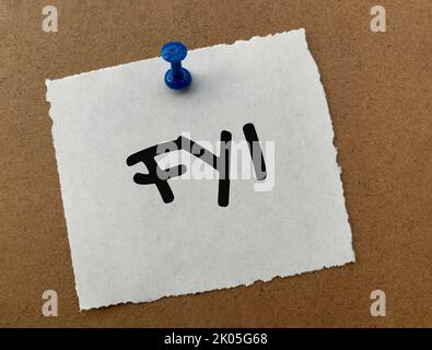 For your information text on white notepad with wooden background. Information concept. Stock Photo