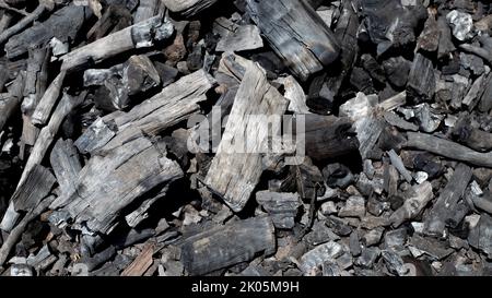 natural charcoal hardwood charcoal on a white background. Stock Photo