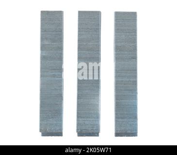 Metal staples for staple machine isolated on white background close up. Stock Photo