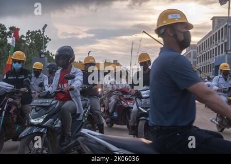 Konawe, Indonesia. 09th Sep, 2022. PT. OSS workers prepare to return to their respective homes after the end of their shifts in Konawe. A smelter company in Morosi sub-district, Konawe, Southeast Sulawesi, namely PT. VDNI and PT. OSS are mining areas and become one of the national vital objects. Credit: SOPA Images Limited/Alamy Live News Stock Photo