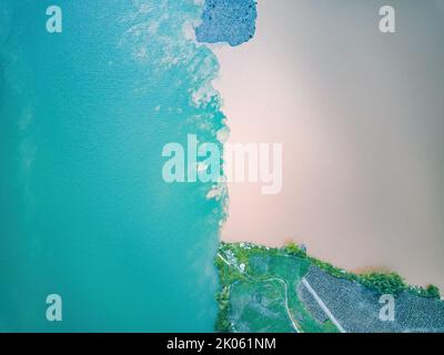 Sanjiangkou, Nanning, Guangxi, China, the dividing line where the two rivers meet Stock Photo