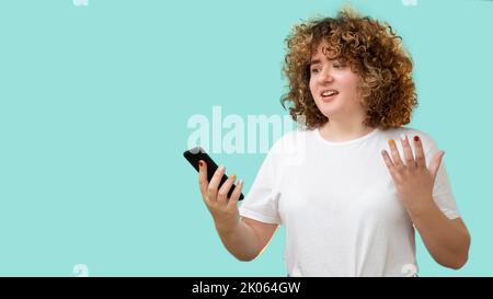 phone scam body shaming overweight woman phone Stock Photo