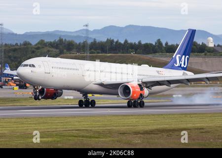 A SAS Scandinavian Airlines Airbus A330-300 arriving at Oslo Airport after a long range flight from the USA Stock Photo