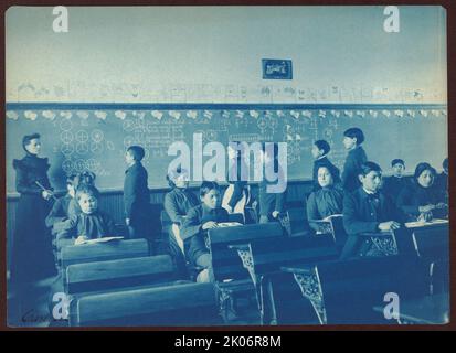 Native Americans during mathematics class at Indian School, Carlisle, Pennsylvania, 1901. (Boarding school for Native American students, founded in 1879 under US governmental authority). Stock Photo