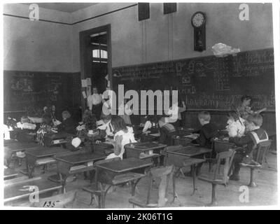 Classroom scenes in Washington, D.C. public schools: general classroom scenes, 1st Division, (1899?). Stock Photo