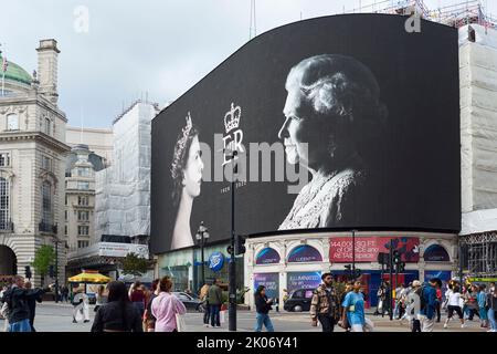 Display at Piccadilly Circus, central London UK, on Friday 9th September, the day after the death of the Queen was announced Stock Photo