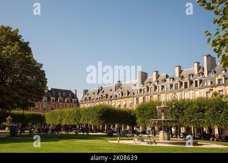 Paris, France. August 2022. Place de Vosges is one of most beautiful squares in Paris. High quality photo Stock Photo