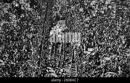 The body of Mahatma Gandhi is drawn by Indian naval ratings on the way to the pyre on the banks of the Jumna for his funeral in 1948. Mohandas Karamchand Gandhi (2 October 1869 - 30 January 1948) was an Indian lawyer, anti-colonial nationalist and political ethicist who employed nonviolent resistance to lead the successful campaign for India's independence from British rule, and to later inspire movements for civil rights and freedom across the world