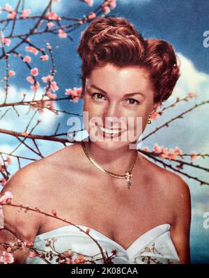 Esther Jane Williams (August 8, 1921 - June 6, 2013) was an American competitive swimmer and actress. She set regional and national records in her late teens on the Los Angeles Athletic Club swim team. Unable to compete in the 1940 Summer Olympics because of the outbreak of World War II, she spent five months swimming alongside Olympic gold-medal winner and Tarzan star Johnny Weissmuller at Billy Rose's Aquacade, and caught the attention of Metro-Goldwyn-Mayer scouts. Williams made a series of films in the 1940s and early 1950s known as 'aquamusicals', which featured elaborate performances wit Stock Photo