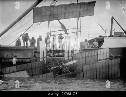 Anthony Jannus, Flights And Tests of Rex Smith Plane Flown By Jannus - Flights of Plane, 1912. Early aviation, USA. Men hauling biplane out of the water. Stock Photo