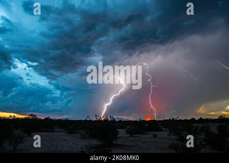 Sunset lightning in the desert Stock Photo