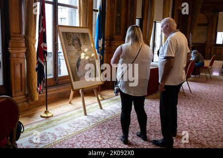 Glasgow, Scotland, 10 September 2022. The public file in and sign a Book of Condolences in the City Chambers as a mark of respect to Her Majesty Queen Elizabeth II who has died aged 96, in Glasgow, Scotland, 10 September 2022. Photo credit: Jeremy Sutton-Hibbert/ Alamy Live news. Stock Photo
