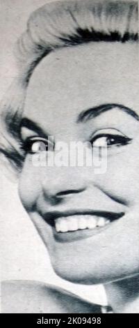 Newspaper photograph of Shirley Eaton (born 12 January 1937), English actress, author and model. Eaton appeared regularly in British films throughout the 1950s and 1960s, and gained her highest profile for her iconic appearance as Bond Girl Jill Masterson in the James Bond film Goldfinger (1964), which gained her bombshell status. Stock Photo