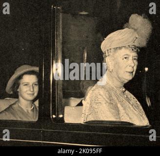 HM Queen Mary with her 12-year-old grand daughter Princess Alexandra of Kent arrive for the Earl of Harewood's wedding. Mary of Teck (Victoria Mary Augusta Louise Olga Pauline Claudine Agnes; 26 May 1867 - 24 March 1953) was Queen of the United Kingdom and the British Dominions, and Empress of India, from 6 May 1910 until 29 January 1936 as the wife of King-Emperor George V. Stock Photo