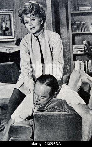 Bob Hope and Lucille Ball in Critic's Choice, a 1963 comedy film. Leslie Townes 'Bob' Hope KBE KC*SG (May 29, 1903 - July 27, 2003) was a British-American stand-up comedian,[2] vaudevillian, actor, singer, dancer, and author. With a career that spanned nearly 80 years. Lucille Desiree Ball (August 6, 1911 - April 26, 1989) was an American actress, comedian, model, studio executive, and producer. She was nominated for 13 Primetime Emmy Awards, winning five times and was the recipient of several other accolades, such as the Golden Globe Cecil B. DeMille Award and two stars on the Hollywood Walk Stock Photo