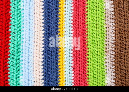 vertical multi colored crochet lines pattern, abstract close up background Stock Photo
